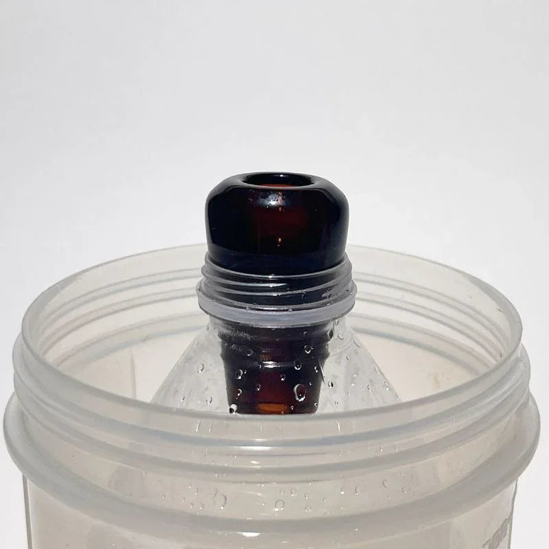 amber glass greeb in bottle
