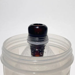 amber glass greeb in bottle