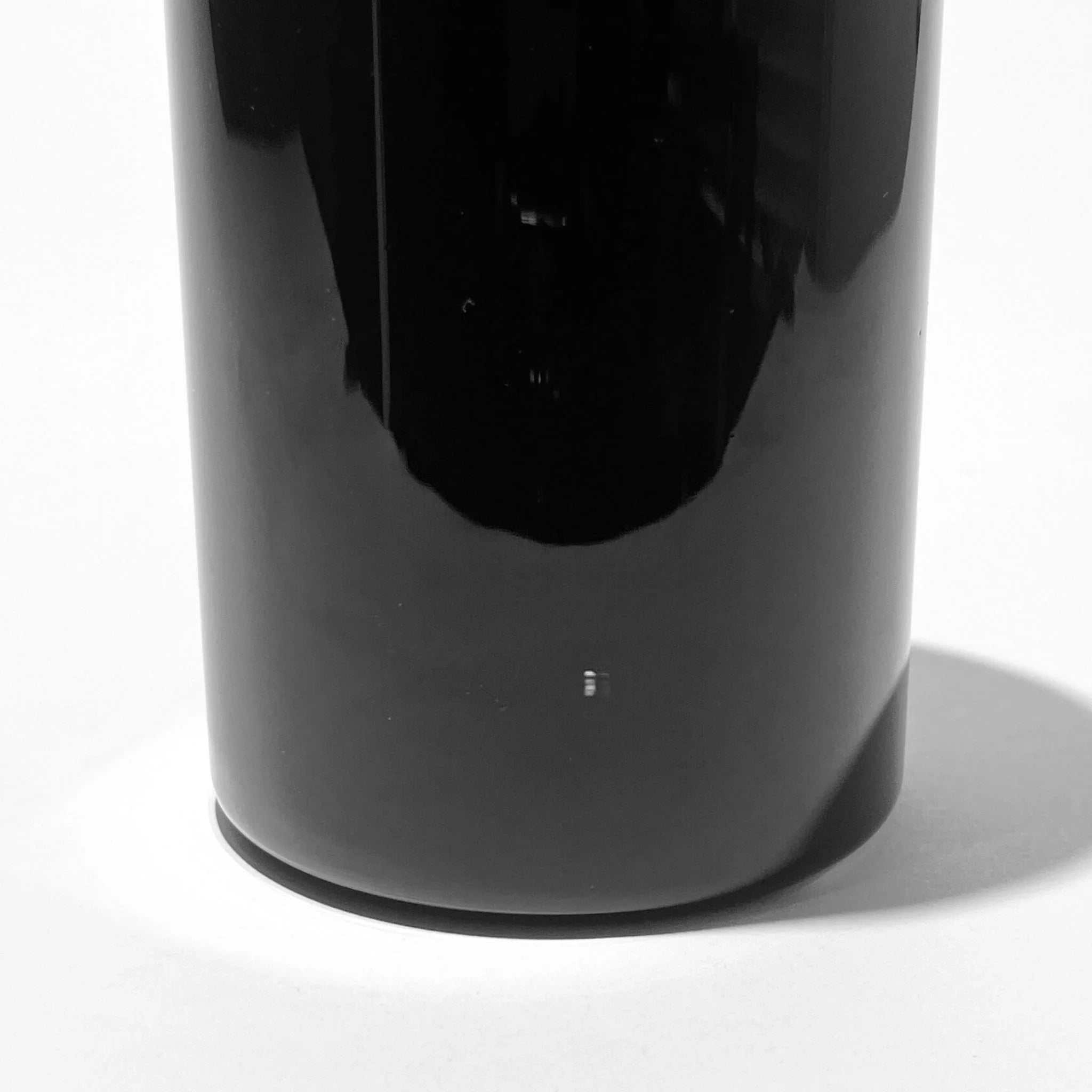 closeup of the black travel gravity bong jar