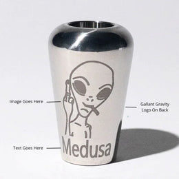 Stainless steel bong bowl with engraved alien face, labeled Medusa, for gravity bong use.