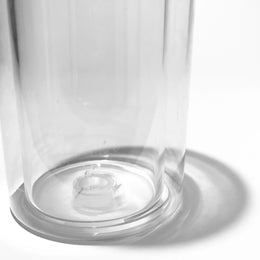 Clear glass gravity bong chamber with minimalist modern design on white background