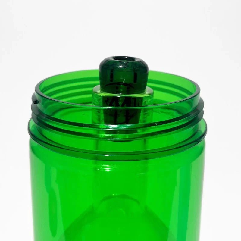 Close-up of a green glass gravity bong chamber with clear mouthpiece on white background