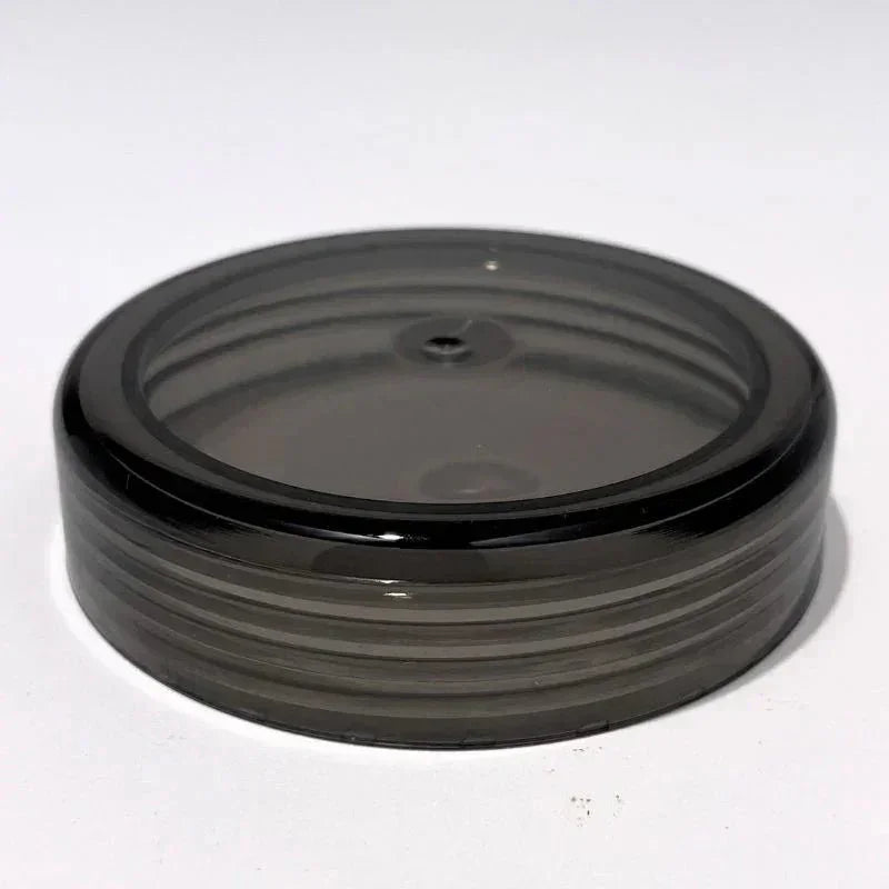 Replacement glass gravity bong top lid with a smooth, round, dark transparent finish