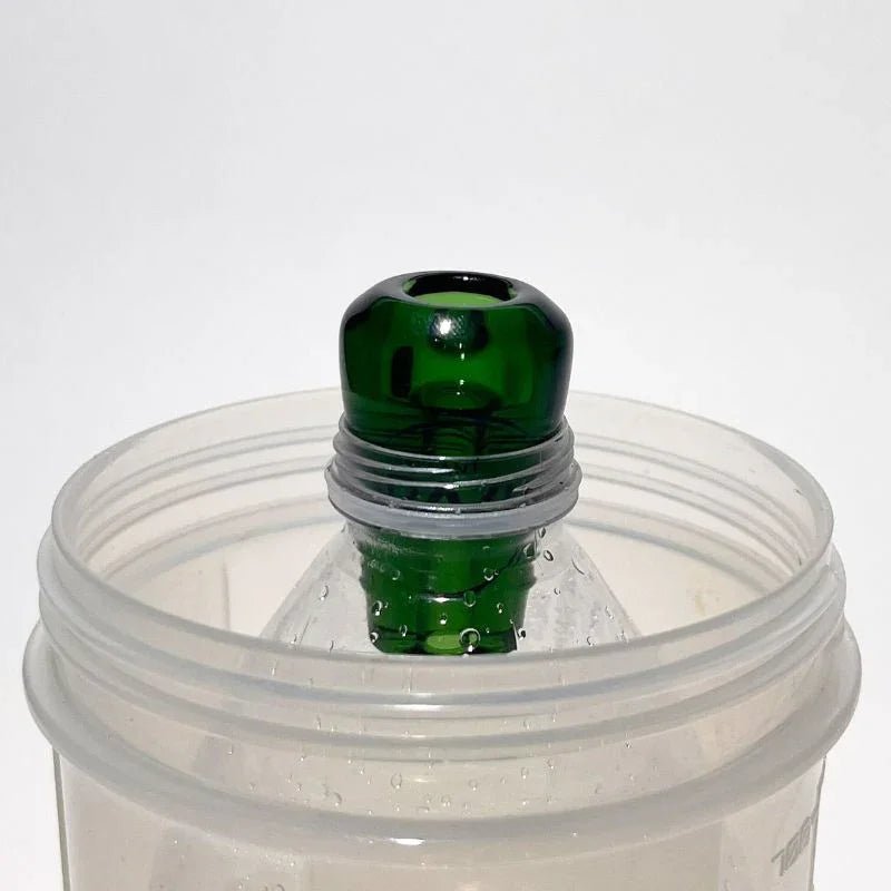 green glass greeb in bottle