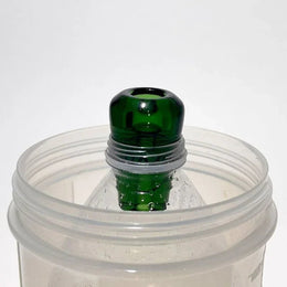 green glass greeb in bottle
