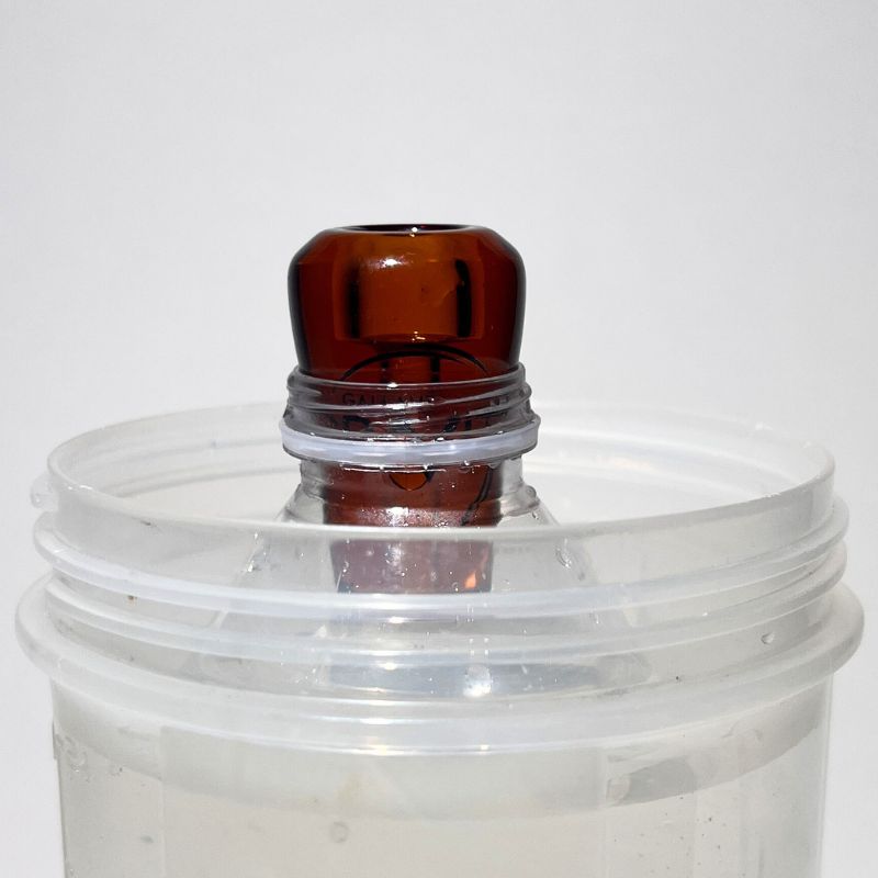 amber glass greeb in bottle